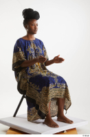  Dina Moses  1 dressed sitting traditional decora long african dress whole body 0014.jpg